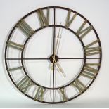 A 20th century metal clock dial face, 123cm wide and a brass bed head, 156cm wide x 122cm high, (2).