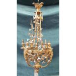 A modern gilt bronze six branch chandelier of classical Renaissance style, cast with cherub figures,