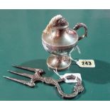 A table lighter, of urn shaped form, the handle with a mythological animal head finial,