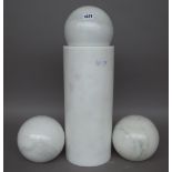 Three modern white marble spheres and a matching marble cylinder, unsigned, sphere 51cm dia,