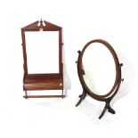 A Victorian mahogany pier mirror, with integral glove box and hanging rail,