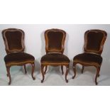 A set of three 19th century French carved oak side chairs of Louis XV design,