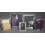 Eight modern silver plate mounted strut back photography frames,