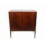 A mid-20th century teak side cabinet with tambour front on tapering supports, 83cm wide x 89cm high.