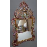 Jay Strongwater; a gilt metal and enamel strut back photograph frame, foliate design,