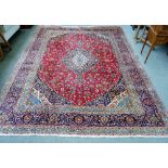 A large decorative Persian carpet in a variant of a Tabriz design,