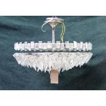 A modern chrome and glass ten branch chandelier,