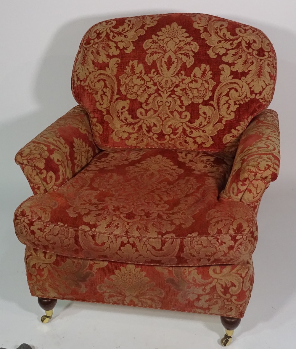 A 20th century red and gold upholstered three seater sofa,