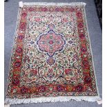 A pair of Tabriz rugs, Persian, the pale sage fields each with a pink medallion, matching spandrels,