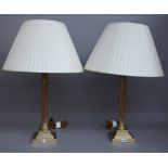 A pair of Victorian style brass table lamps,