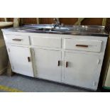 A 20th century retro kitchen unit with fitted steel sink and cupboards below,162cm.