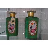 A pair of French green ground porcelain scent bottles, mid-19th of canted square section,