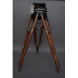 An Akeley Gyro tripod for an early 20th century 35mm movie camera.