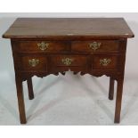 A George III oak lowboy on square supports, 86cm wide x 71cm high.