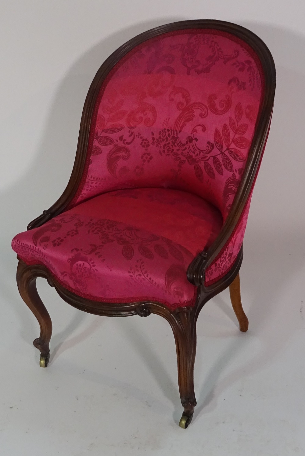 A 19th century French walnut framed pink upholstered nursing chair on cabriole supports, 77cm high. - Image 2 of 2