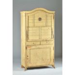 An early 19th century Continental painted pine arch top cupboard, with a pair of doors,