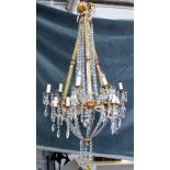 A modern gilt bronze twelve branch chandelier of Victorian style,