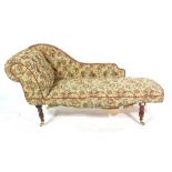 A 20th century mahogany framed chaise longue, with floral button back upholstery,