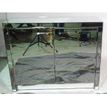 A Brighton mirrored two door side cabinet, 110cm wide x 87cm high.