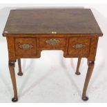 A Queen Anne burr walnut side table with three drawers on cabriole supports, 72cm wide x 70cm high.