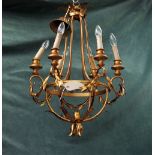 A modern gilt metal and wooden mounted six branch chandelier of open frame form,