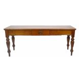 A 19th century walnut serving table with single frieze drawer on turned supports,