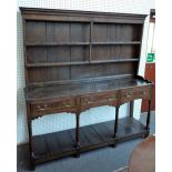 A mid-18th century oak dresser,