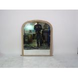 A 20th century pine arch top overmantel wall mirror, 90cm wide x 110cm high.