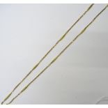 A gold necklace, in a tapered bar and faceted oval link design, detailed 750,