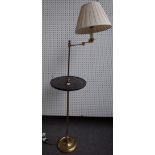 A modern gilt metal standard lamp with adjustable anglepoise arm,