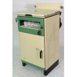 A mid-20th century New World cream gas cooker, 52cm wide and an oval metal bucket, (2).