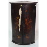 A mid-18th century chinoiserie decorated corner cabinet, 92cm high x 57cm wide, (a.f).