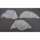 Three early Victorian baby's lace embroidered bonnets, (3).