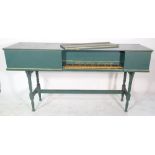 Robert Davis Levens 1976; a 20th century green painted spinet on stand, 170cm wide x 86cm high.