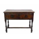 An 18th century style oak two drawer side table, 106cm wide x 81cm high.