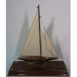 A 20th century model of the Endevour 1934 Americas Cup Yacht, on base.