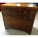 A George III inlaid mahogany chest of two short and three long graduated drawers on bracket feet,