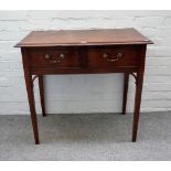 An early 19th century mahogany two drawer side table on tapering square supports,