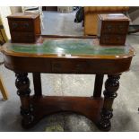A Victorian mahogany Duchess dressing table, on turned supports, 90cm wide x 84cm high.