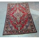 A Persian tribal rug in a Tabriz design,