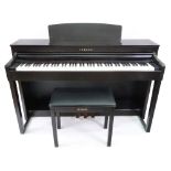 A Yamaha Clavinova CLP- 440 digital piano, rosewood finish, 142cm wide x 51cm deep x 89.