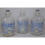 Kuench Orange squash; a set of three glass twin handled storage containers, each 31cm high, (3).