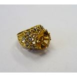 A gold, citrine and diamond ring,