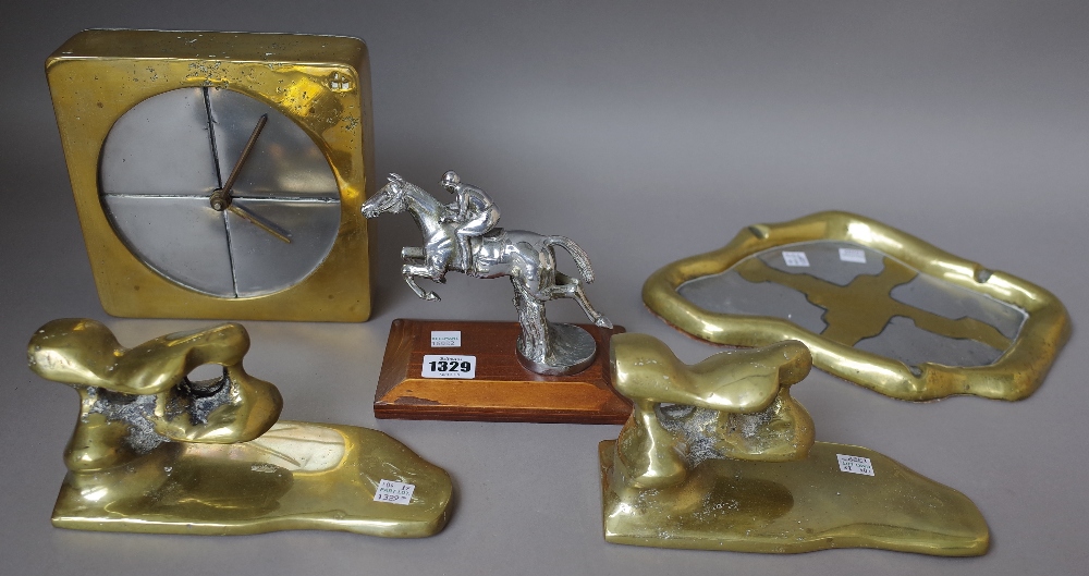 A silver plated car mascot modelled as a jumping racehorse, 12cm high,