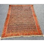 A fine Senneh rug, Persian, the dark indigo field with an allover herati design,