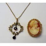 A gold, amethyst and seed pearl set pendant, designed as a wreath, with a neckchain,