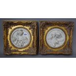 A pair of modern reconstituted circular marble plaques,