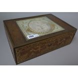 A French leather bound box, late 19th century, foliate embossed,