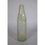 Allen & Lloyd Aldershot; a ginger beer 'codd' bottle, with integral marble stopper, 21.5cm high.