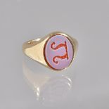 A gold and sardonyx set gentleman's oval signet ring, the oval sardonyx crest seal engraved,